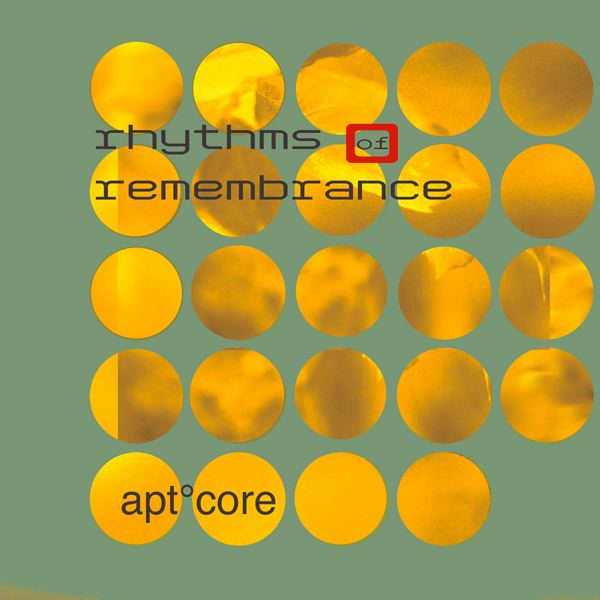 Album Art of apt.core's Rhythms Of Remembrance album - On a light green background, 24 circles are cut into it in rows of 5, and each hole has some sort of gold foil texture or something in it. On the bottom row, on top of the first two circles, it says 'apt.core', the artist name. And towards the top it says the album name, with the 'of' being smaller and having a red box around it.