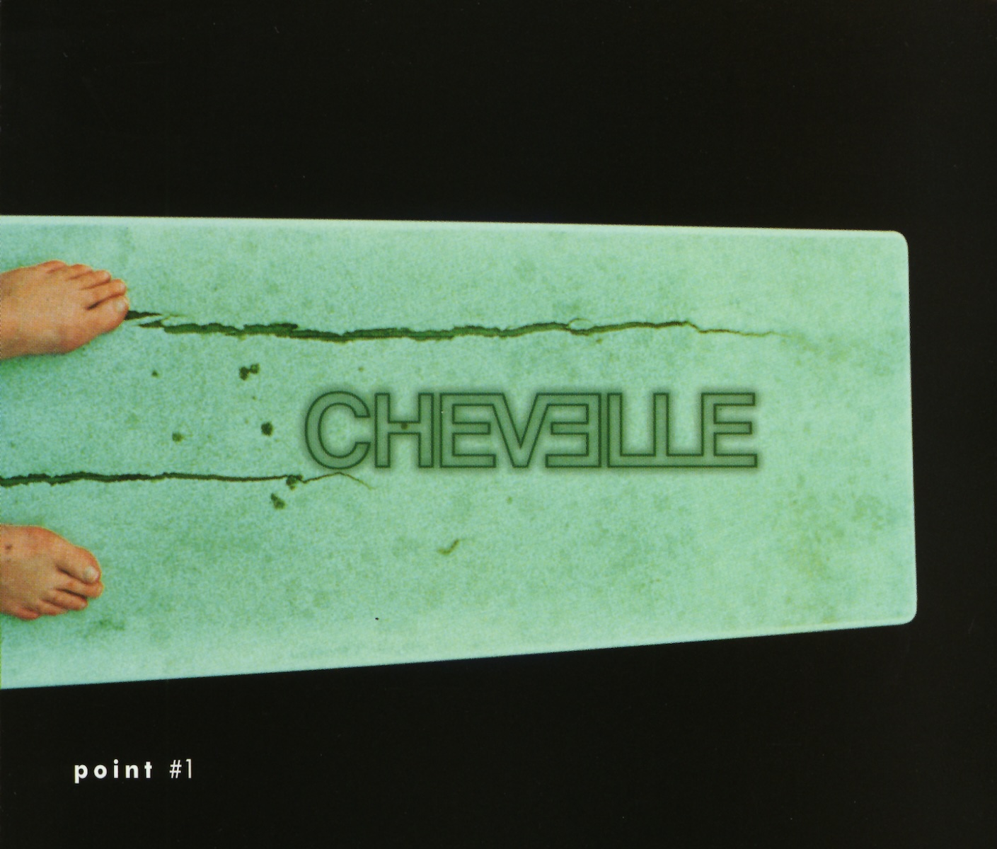 Album Art of Chevelle's Point #1 album - On a black background, the middle is a light green color and looks like either a green marble or some sort of rug, though there's dark gouges/cracks in it and a few holes. On the left edge there is the tops of two feet poking into the frame, which is why I think it's a bit of floor, carpet, or maybe a bathtub? With the rest of it black, it's hard to tell.</body></html>