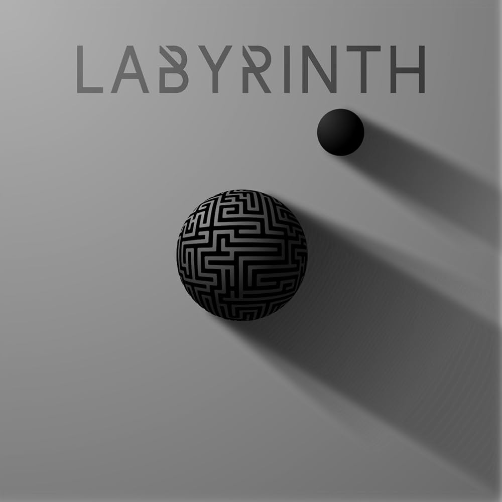 Album Art of David Baloche's Labyrinth album - A gray background has the word 'Labyrinth' on the top quarter in a large font and a darker gray color. In the center is a sphere with a maze covering the visible side of it. And above and to the right is smaller, black sphere. Both spheres cast a large shadow to the bottom right of the illustration.