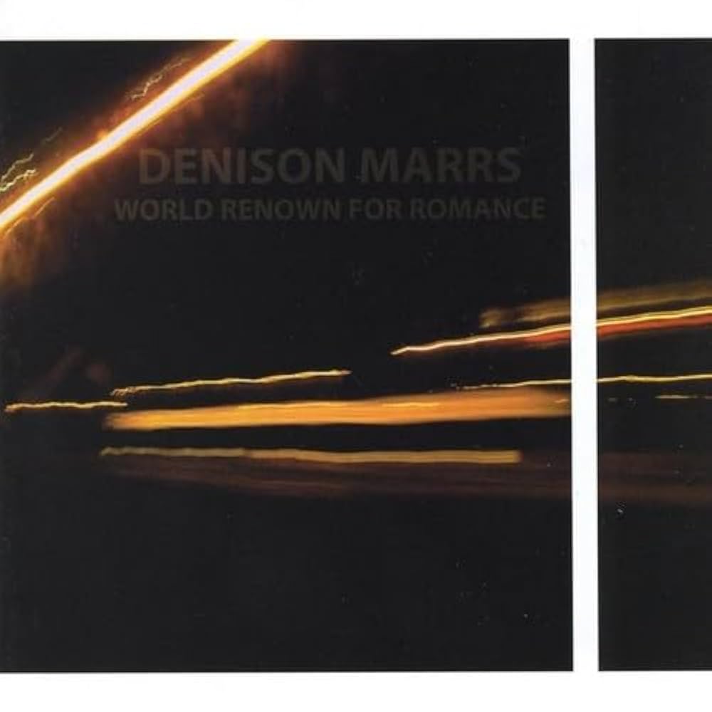 Album Art of Denison Marrs's World Renown For Romance 2005 album re-release - A white frame borders the top and bottom and is offset on about a fifth from the right side. The image is a dark image of some very abstract, streaking lights. It's like someone took a photo in a fast-moving car or with a long exposure on a dark night with some lights going by. The band's name and album title are printed towards the top in just a tiny shade lighter than the photo.