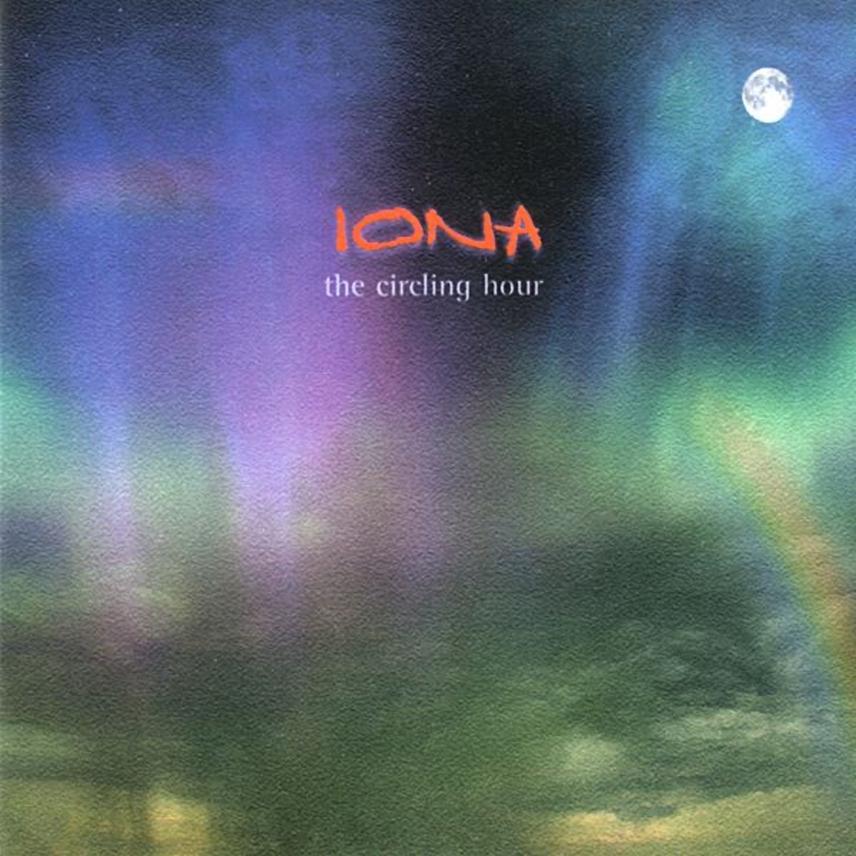 Album Art of Iona's The Circling Hour album - A picture of the sky, with clouds towards the bottom and clear at the top. In the top, there's the moon in the top right and Aurora Borealis of various greens, pinks and purples throughout, with the colors filtering through the clouds below. The band's name is printed in red letters towards the top in the middle, with the album title printed in white, smaller lettering just below it.