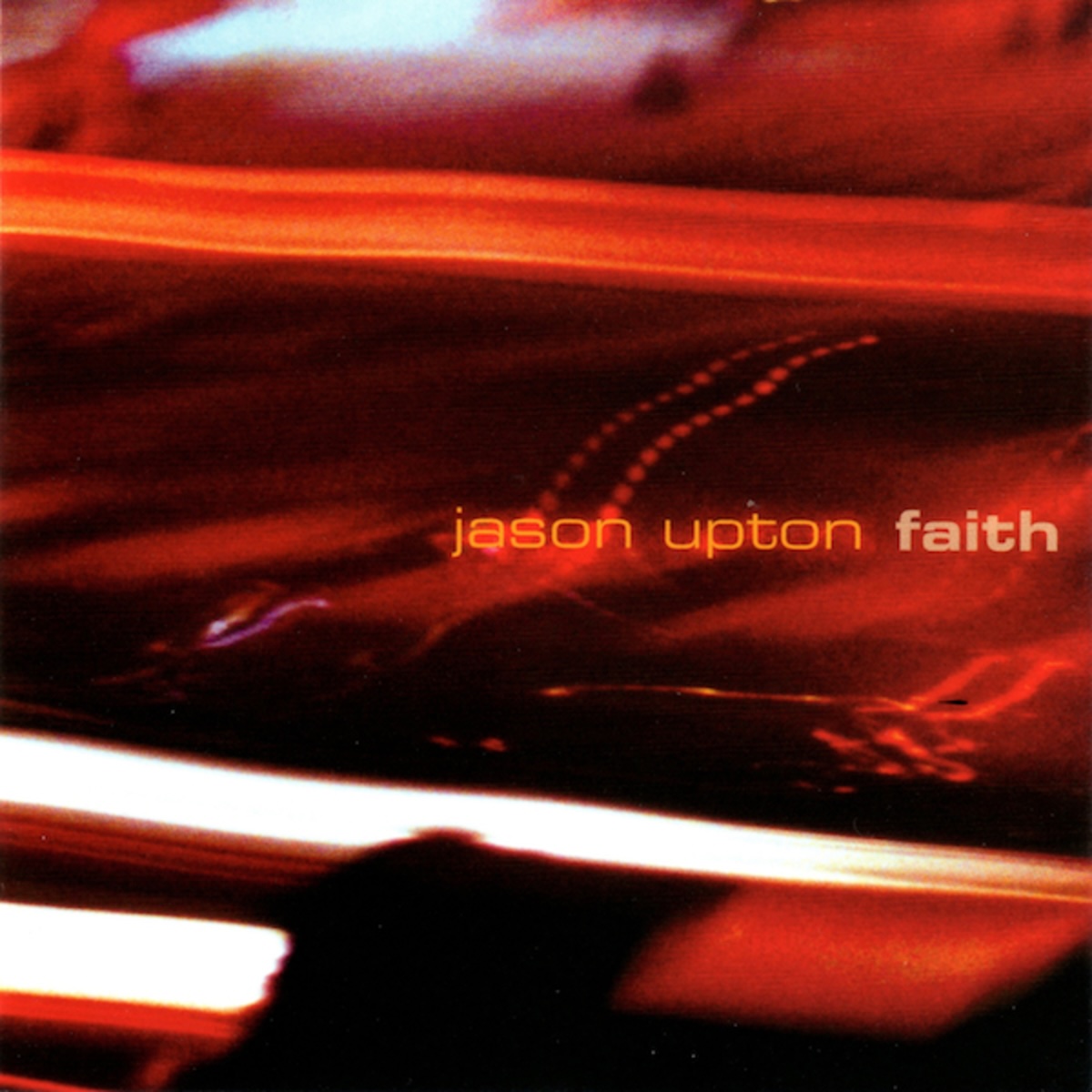 Album Art of Jason Upton's Faith album - It looks like a blurry photo of a street, maybe, or maybe the lights of a street reflecting off some sort of shiny surface. The main defining characteristic of this image is horizontal lines of white and a few smaller lines of red, with some smaller red dots in the image as well. Printed on top of this mostly red, white and black image is the artist's name in a thin, orange font in the middle, with the album title to the right in a semi-transparent, bold white font.