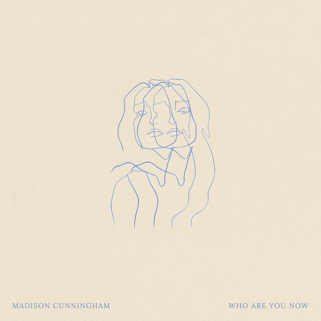 Album Art of Madison Cunningham's Who Are You Now album - On a beige-ish gold background, the middle has a blue sketch of a woman in what looks like thin blue pen, which almost looks like a double image of a person, the second drawn a bit to the right of the first, but they're not exactly a copy of each other, as there are two lips and two noses, but only a left and right eye.</body></html>