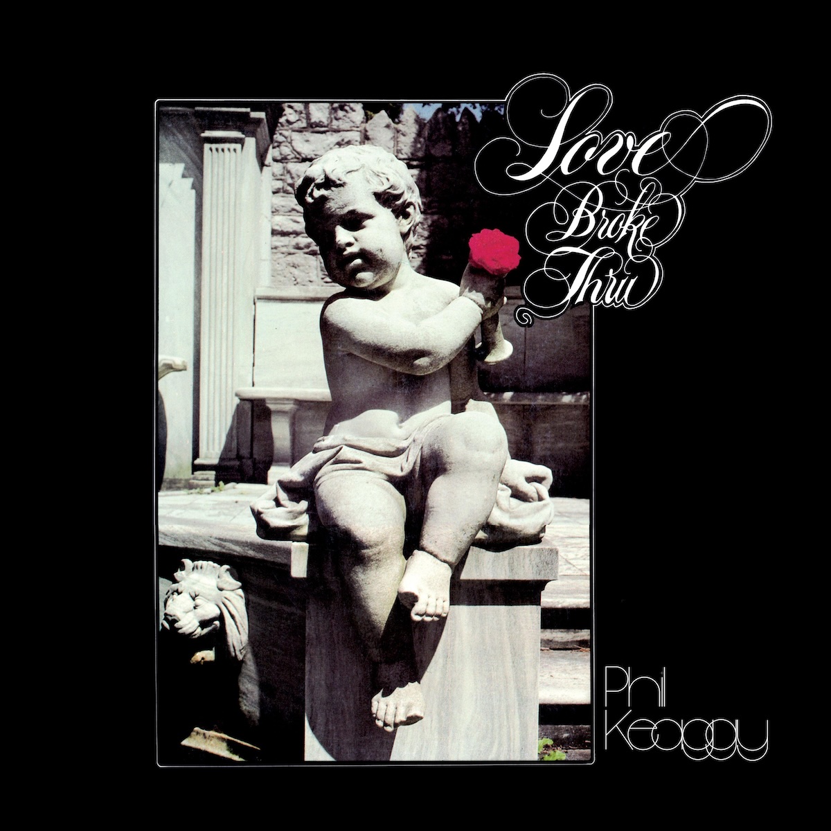 Album Art of Phil Keaggy's Love Broke Thru album - On a black background, in the center is a photo of some stone steps or parapet or something, with a stone carving of a cherub-like boy with no clothes and a stone cloth draped over his sensitive parts. He is holding in his right hand a flower pot which had a bunch of red roses in it. Just to the right of the photo and the roses is the album title in very ornamental white lettering. To the bottom of the photo is in thin white text the artist's name with the letters really close together and even overlapping in some cases.