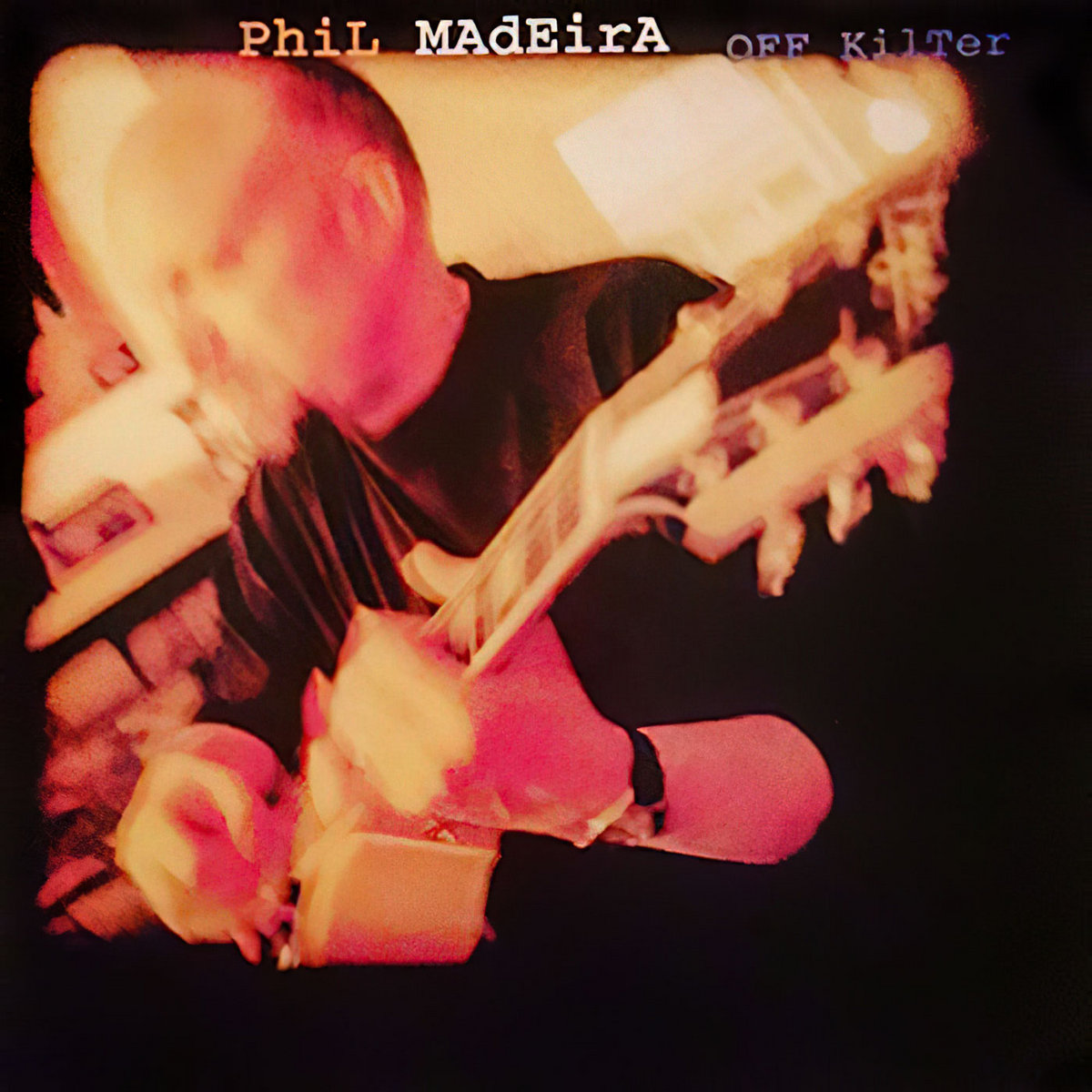  'PhiL MAdEirA', and in smaller blue letters to the right 'OFF KilTer'. The photo is not centered on the black, but closer to the top and hugging the left side.